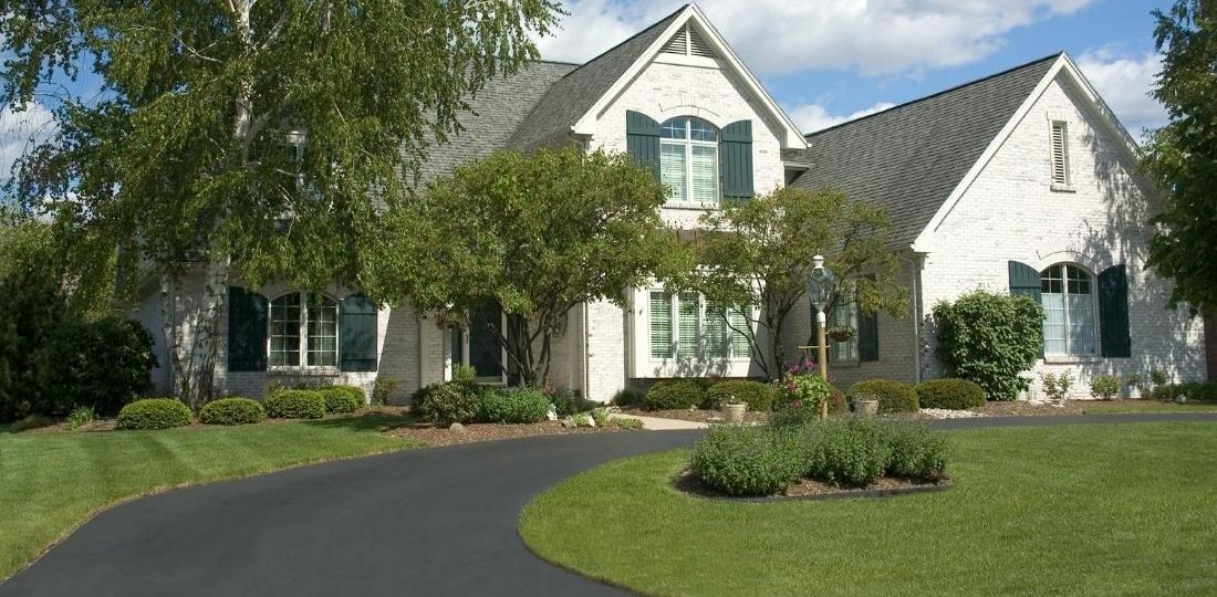 How Driveway Sealcoating Increases Property Value